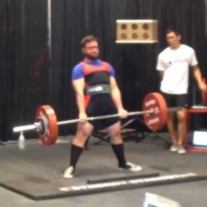 Deadlifting at Canada Strength Symposium - Bar weight 415 lbs - Photo by Emily Boutilier